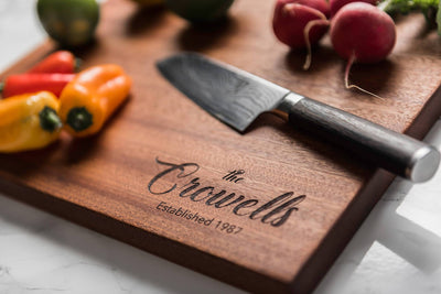 Personalized engraved premium wood cutting board in Sapele by Well Written Gifts